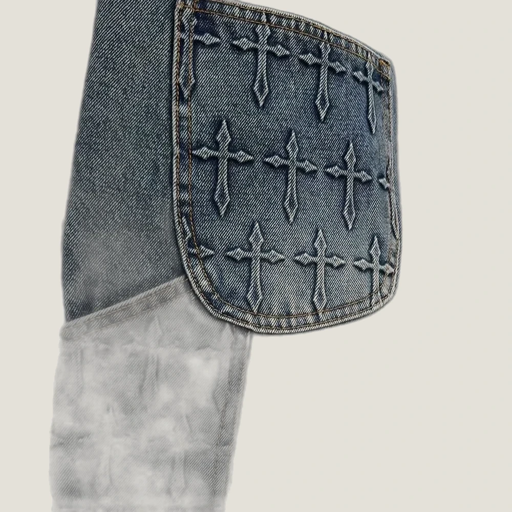 Embroidery detail on denim